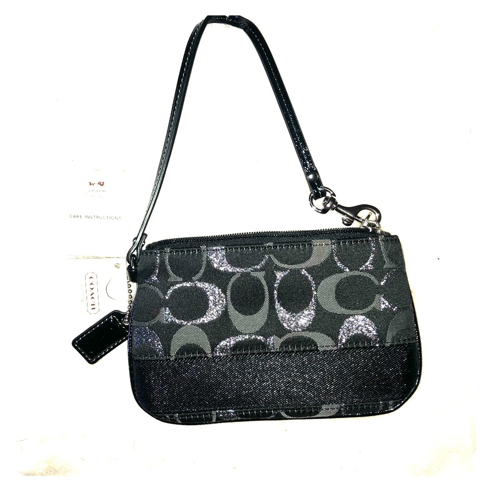 Black with silver Coach Wristlet